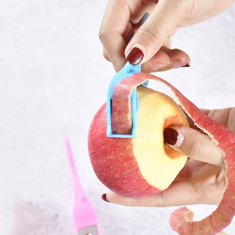 Pelador de Frutas y Verduras con Anillo de Dedo
