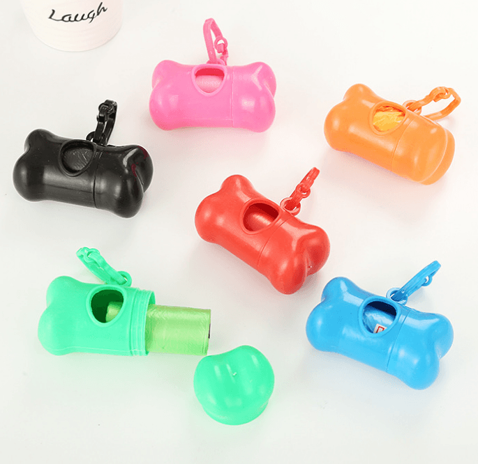 Dispensador de bolsas para residuos con forma de hueso para mascotas