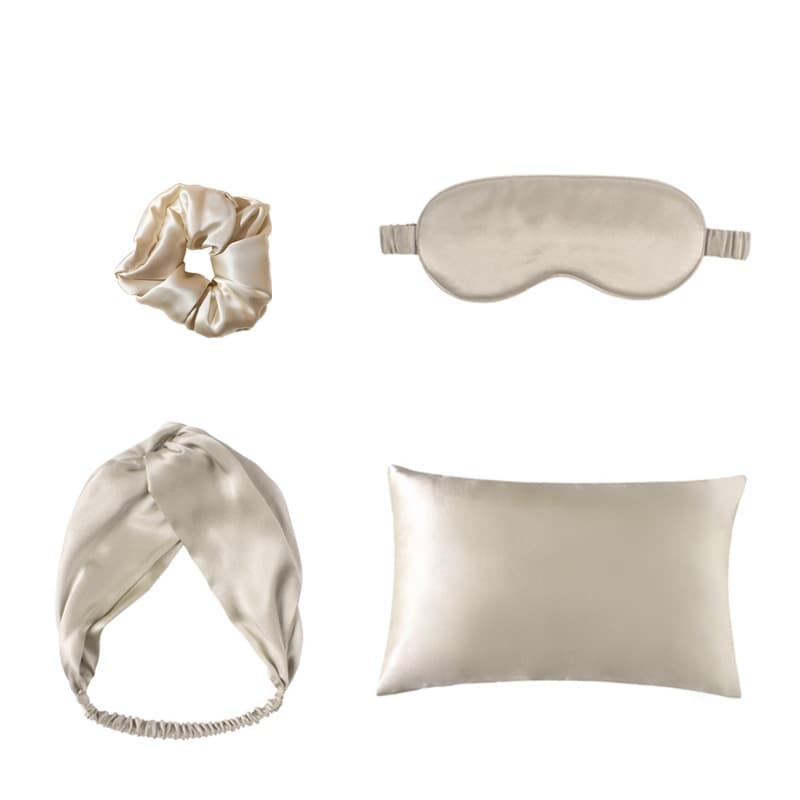 Set de 4 piezas: Antifaz de seda, funda de almohada y coletero